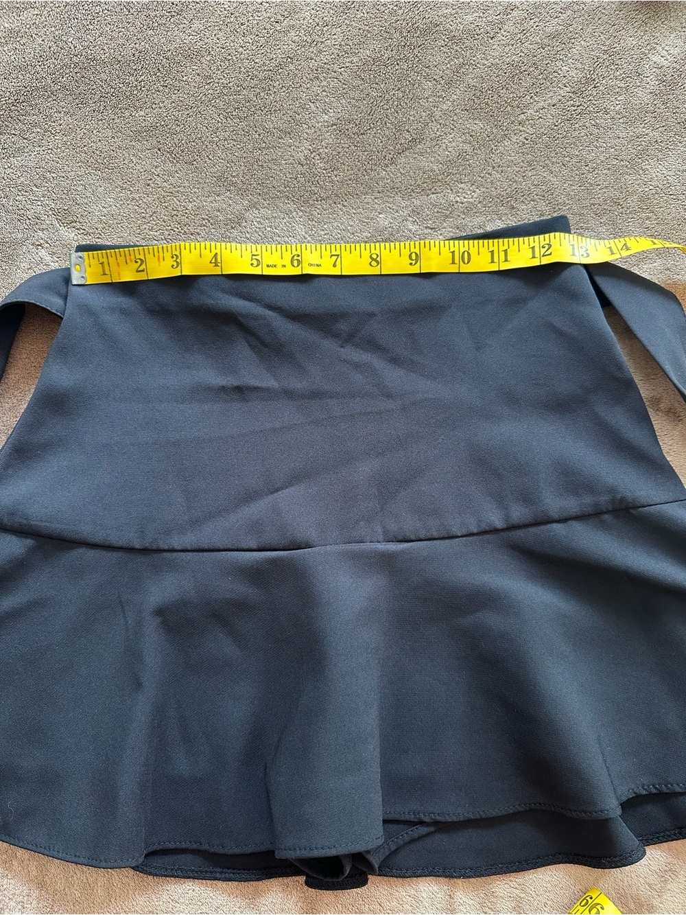 Black Zara skort, size extra small; it has a left-side closure and ties. - Picture 8 of 9